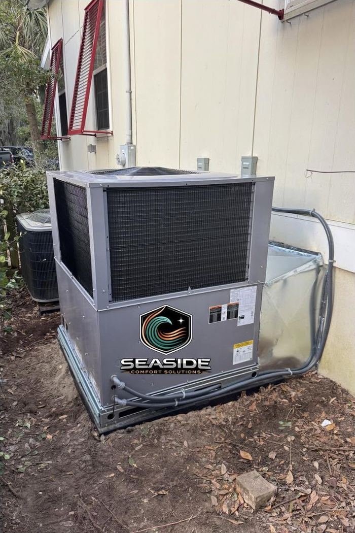 New package unit installed beside the house