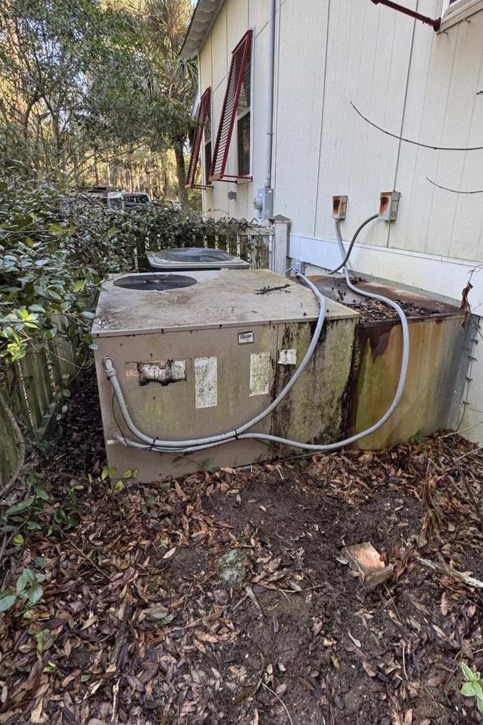 The old package unit, rusted and stained